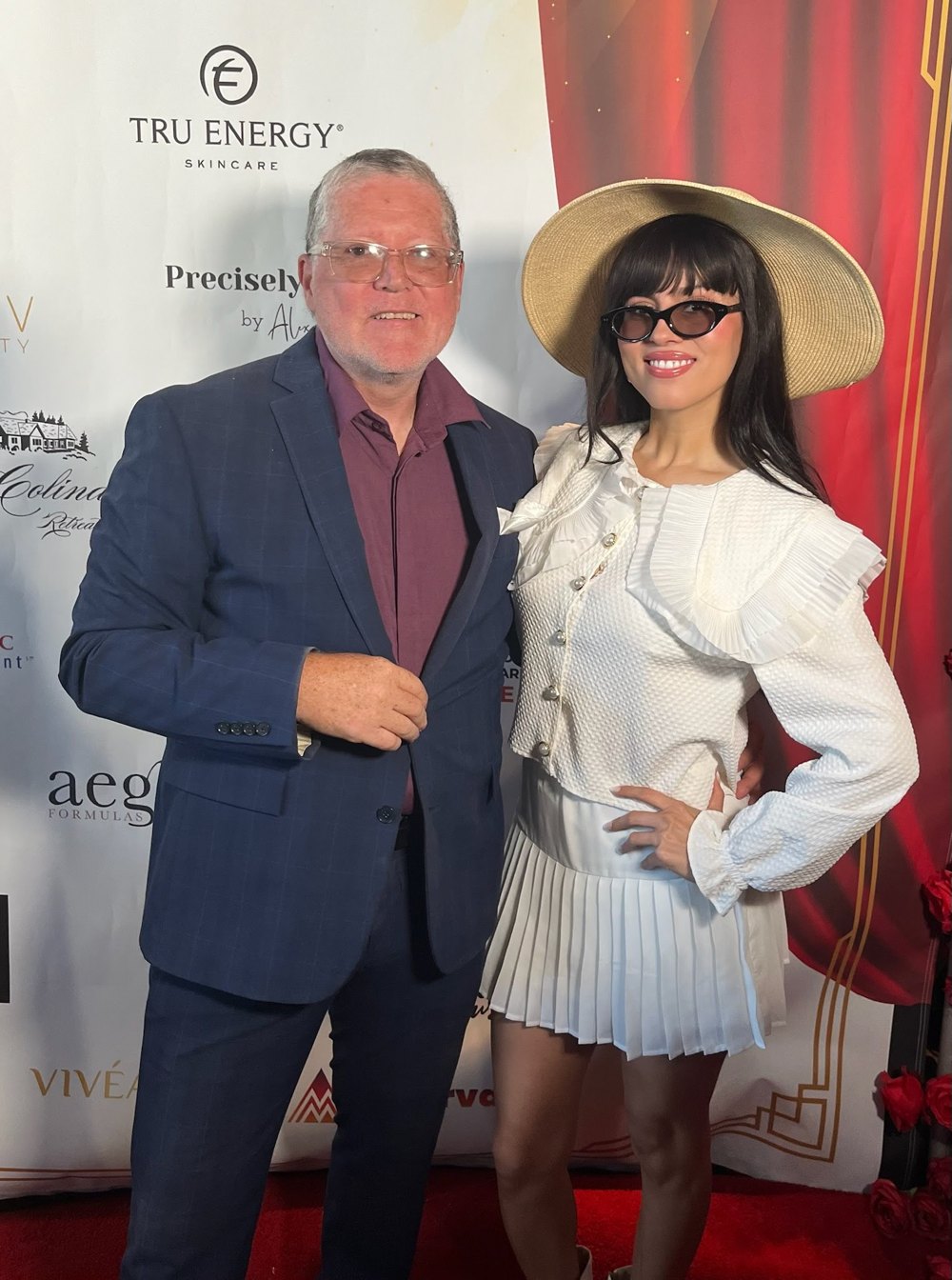 Our head of security in a navy suit on the red carpet