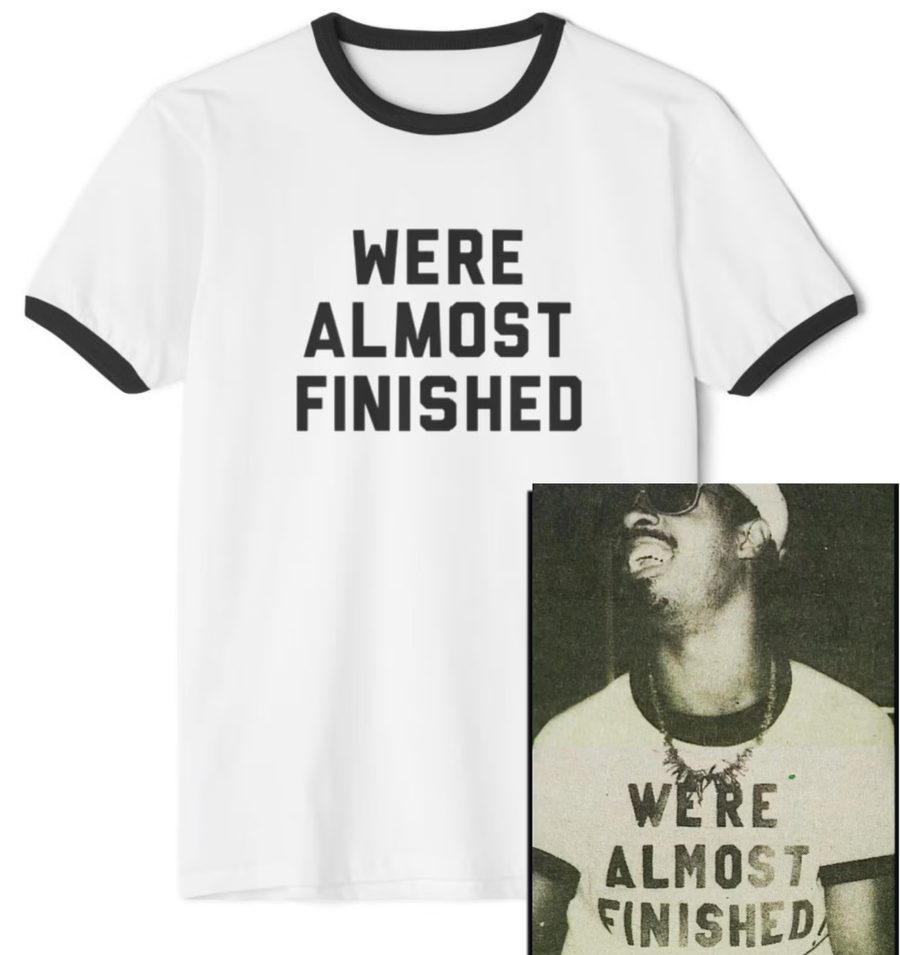 Stevie Wonder wearing the We’re Almost Finished shirt